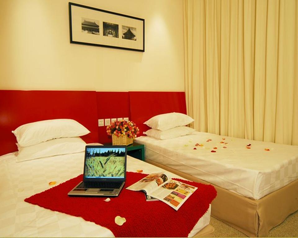 Imaginea Traveler Inn Huaqiao Beijing 3*