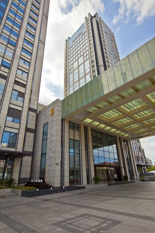 Фотография Mingde Grand Hotel Shanghai 4*