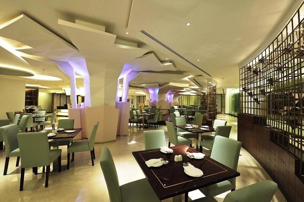 Imaginea Ming Garden Hotel & Residences 4*