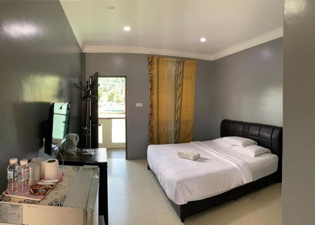 Fotografii Penarak Bamboo Beach Motel 2*