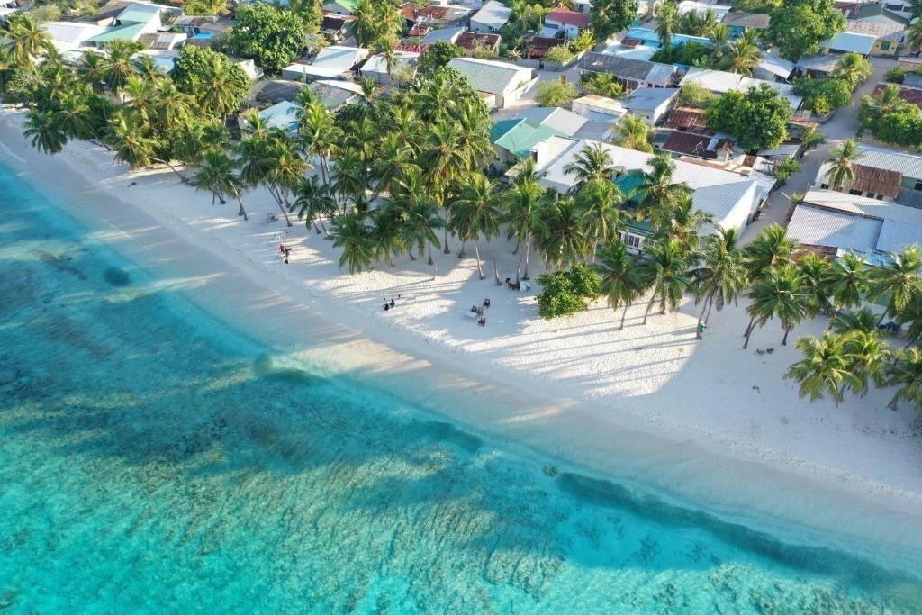 Отель Madi Finolhu Guest House гостиный двор