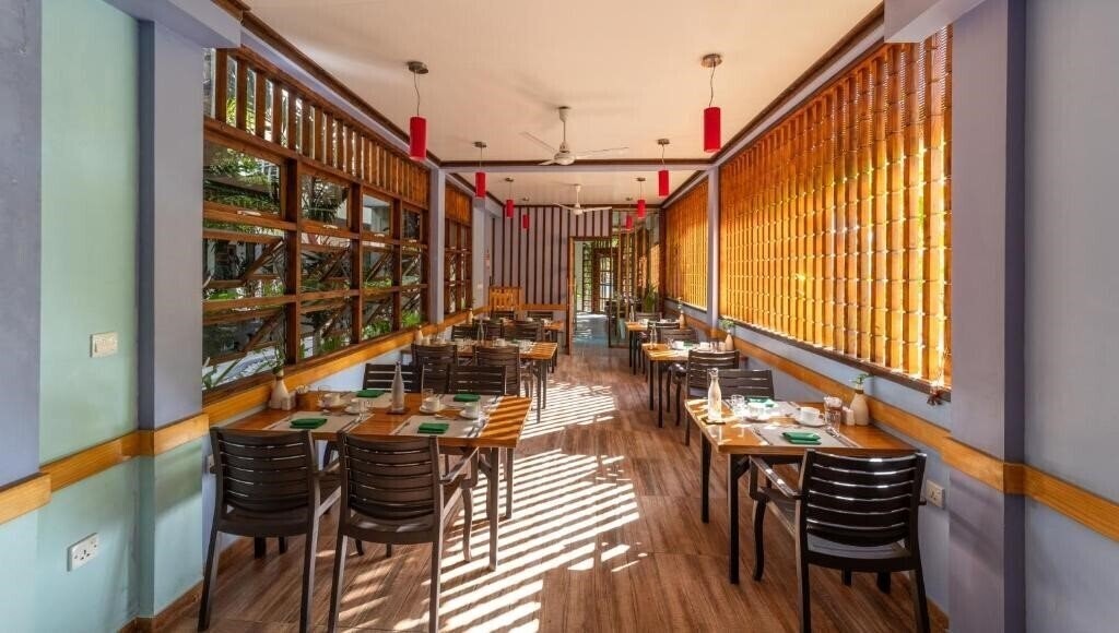 Imaginea Kamadhoo Inn Guest House гостиный двор