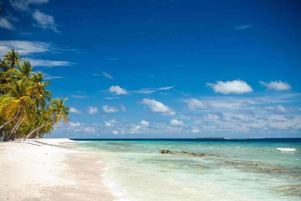 Fotografie Dhonfulhafi Beach View & Spa Guest House гостиный двор