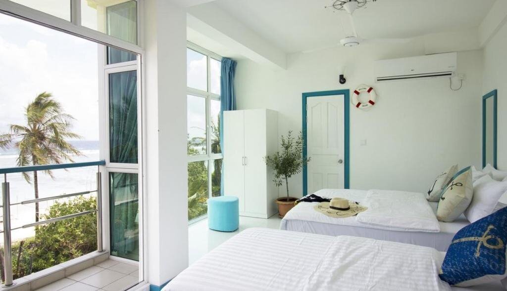 Fotografii The Aquzz Beach Guest House 1*