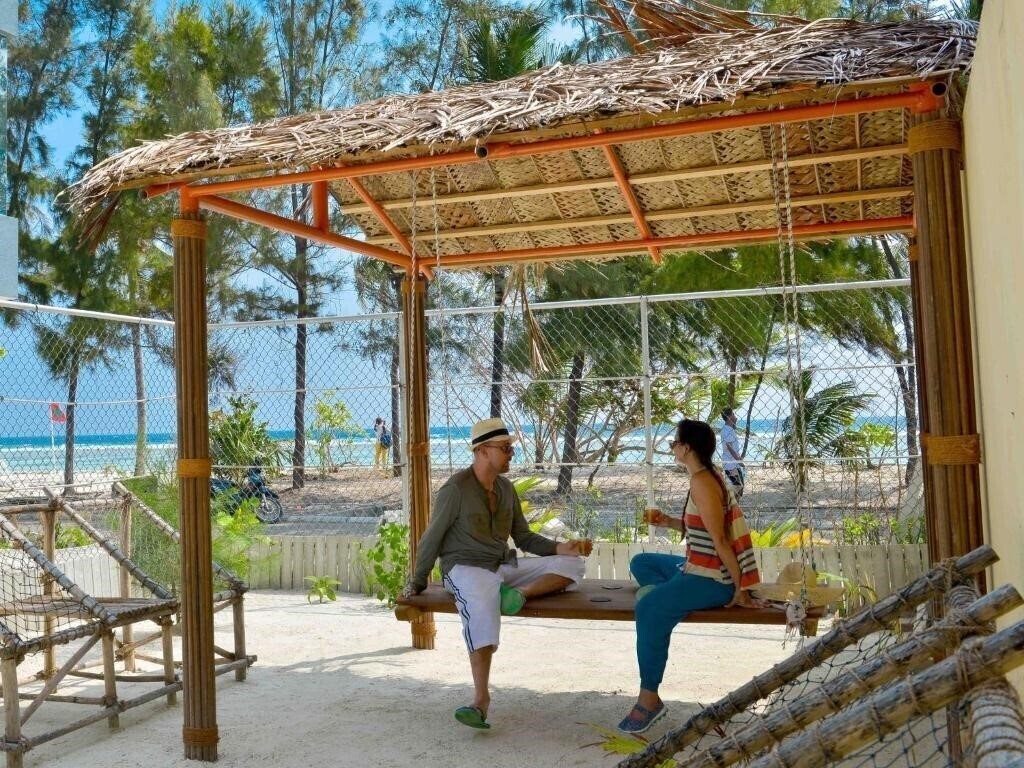 Imaginea Coconut Tree Hulhuvilla Beach 4*