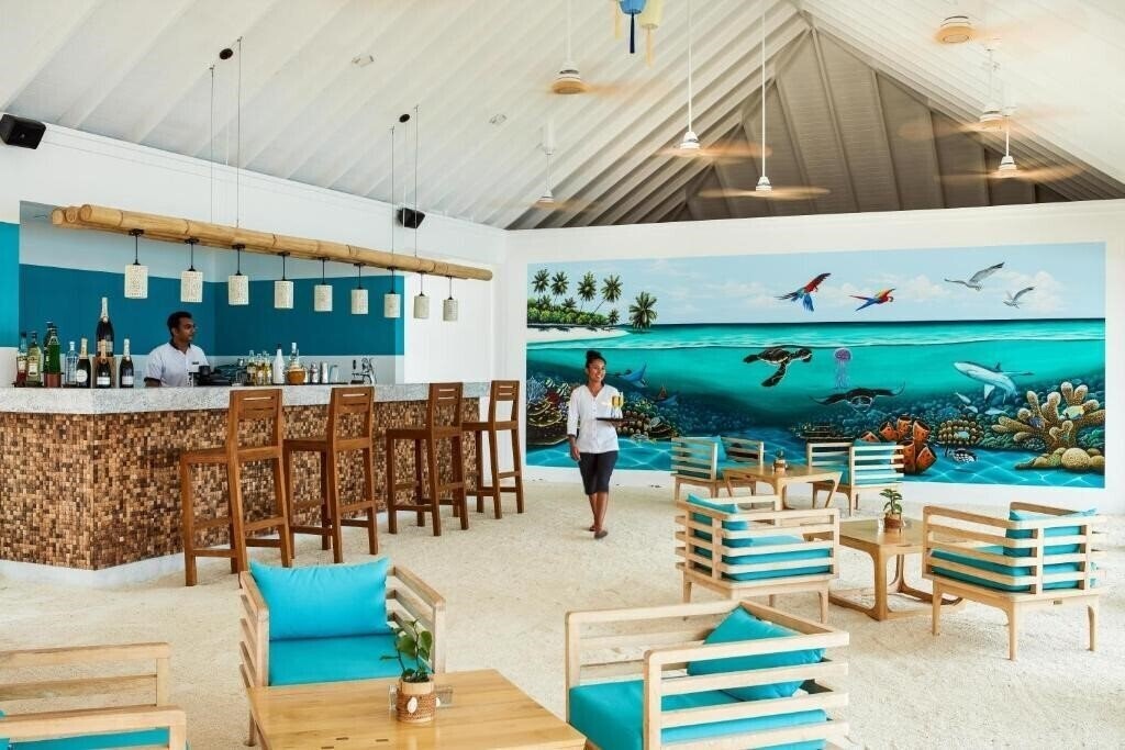 Fotografii Olhuveli Beach & Spa Resort 4*
