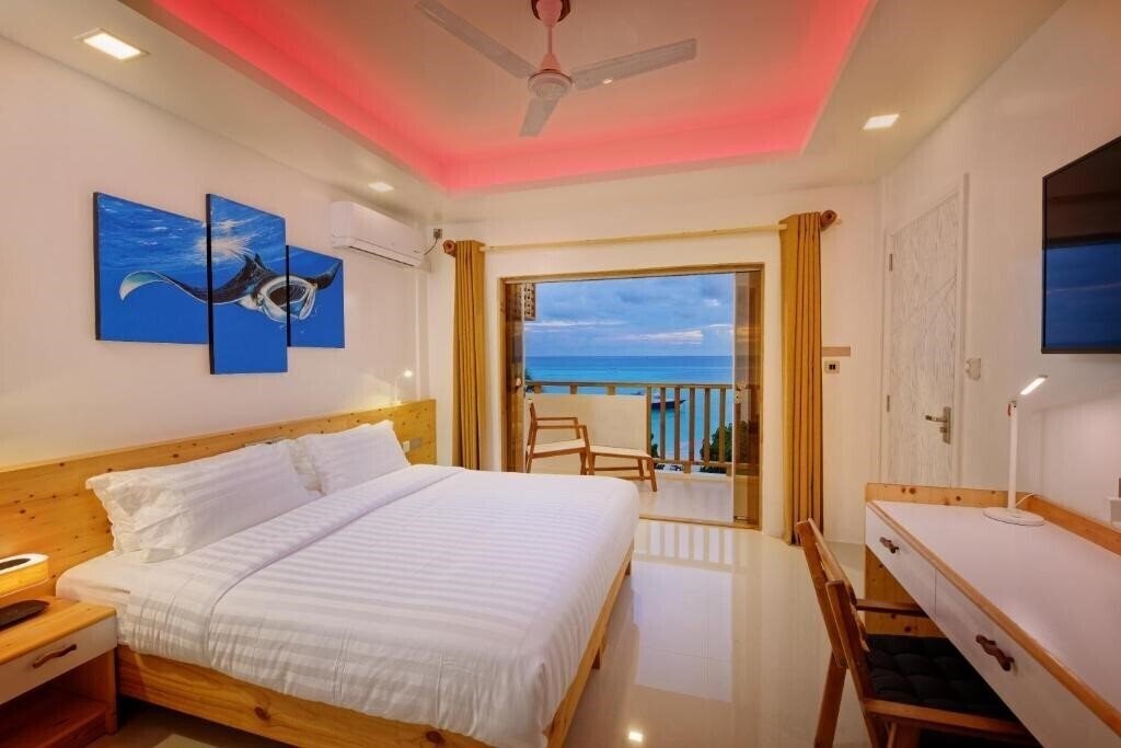 Fotografii Luau Beach Inn Maldives Guest House гостиный двор