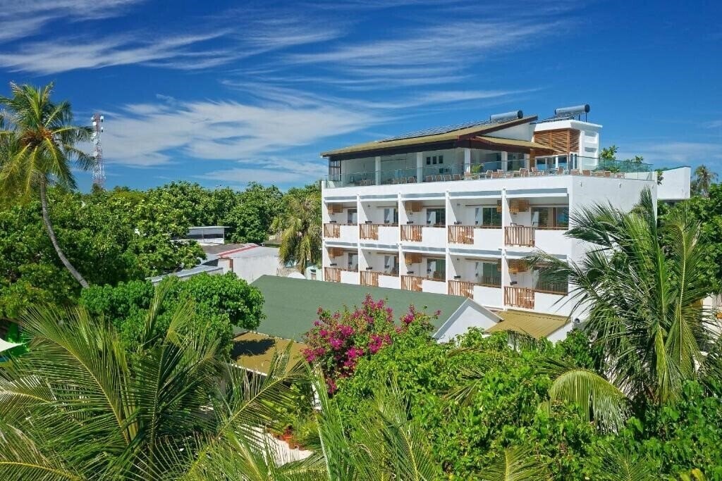 Imaginea Luau Beach Inn Maldives Guest House гостиный двор