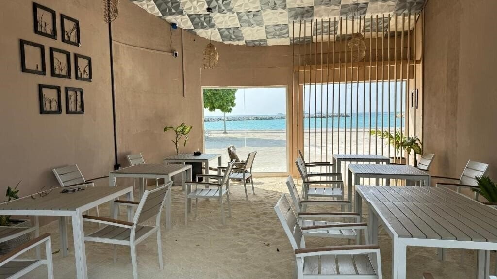 Изображение Alimas Retreat Felidhoo Guest House гостиный двор