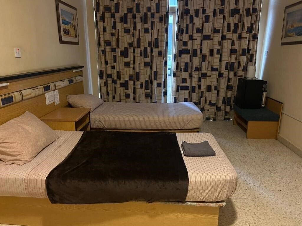 Fotografii Holiday Apartments Valletta апартаменты