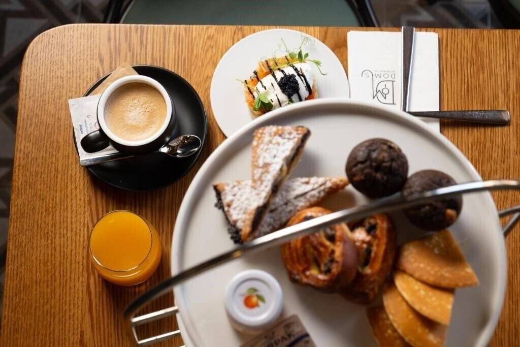 Фотография DOMS Boutique Living 4*