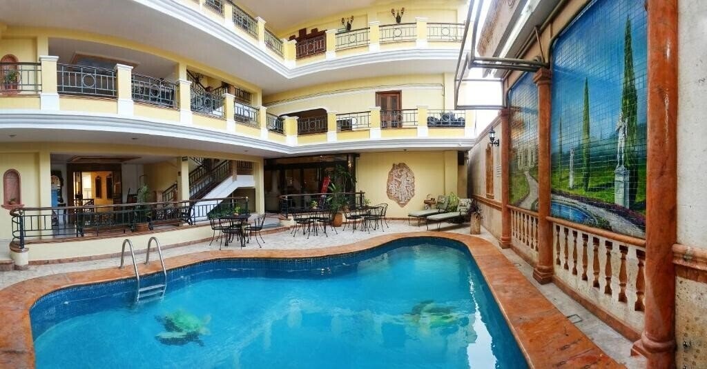 Фотография Residencial Merida 4*