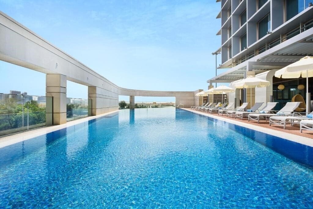 Fotografie Adagio Abu Dhabi Al Bustan апартаменты