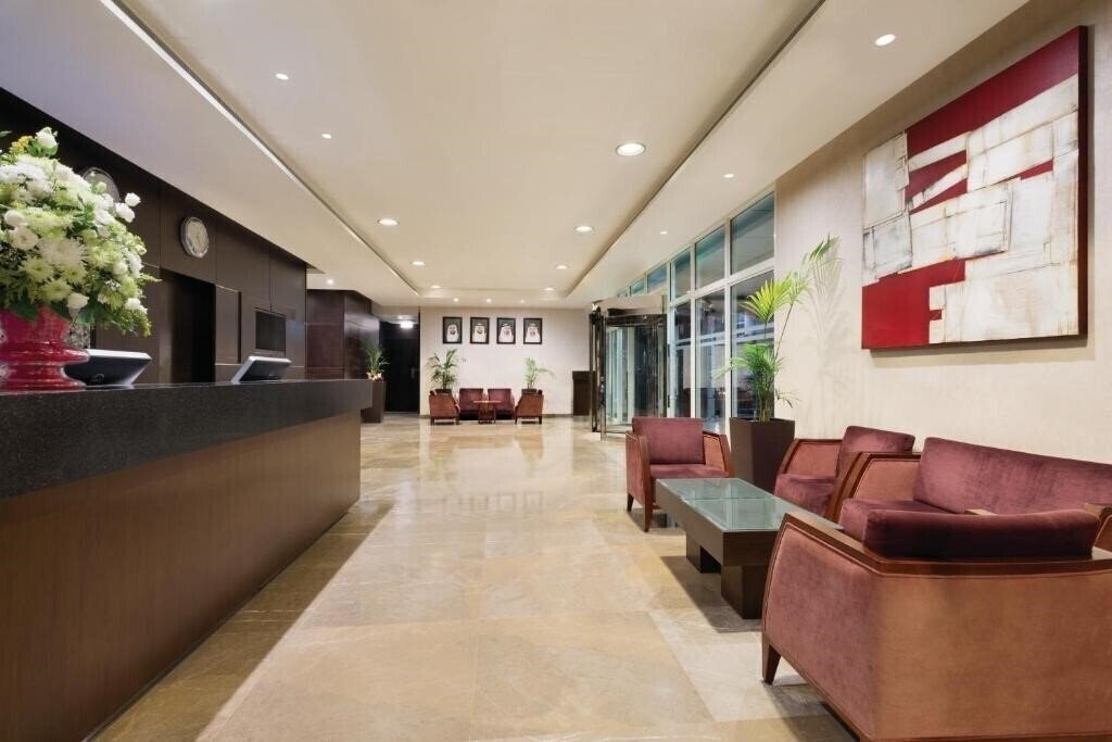 Фото Ramada Downtown Abu Dhabi 4*