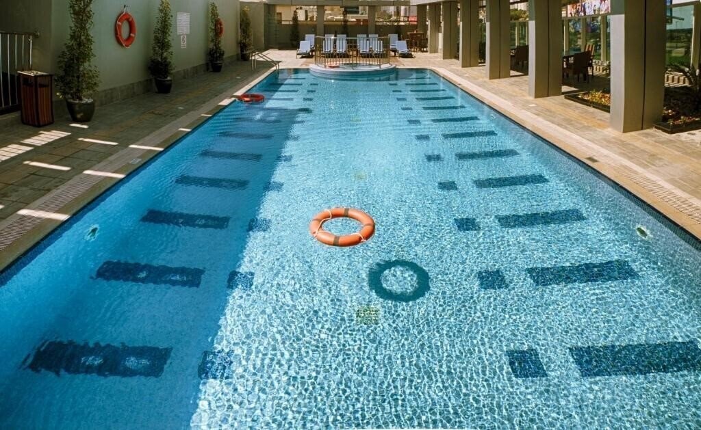 Фото Rose Park Hotel Al Barsha 4*
