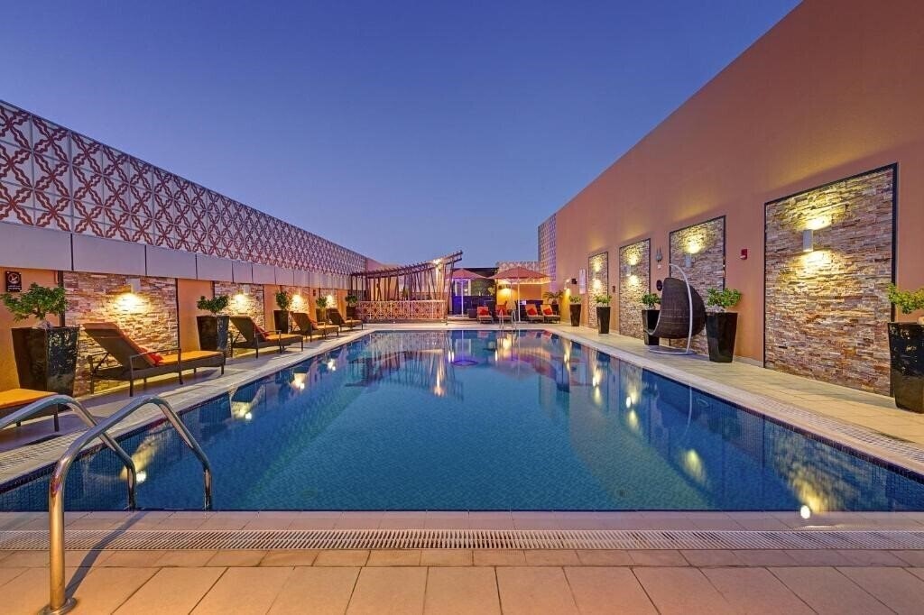 Imaginea Abidos Hotel Apartment Dubailand апартаменты
