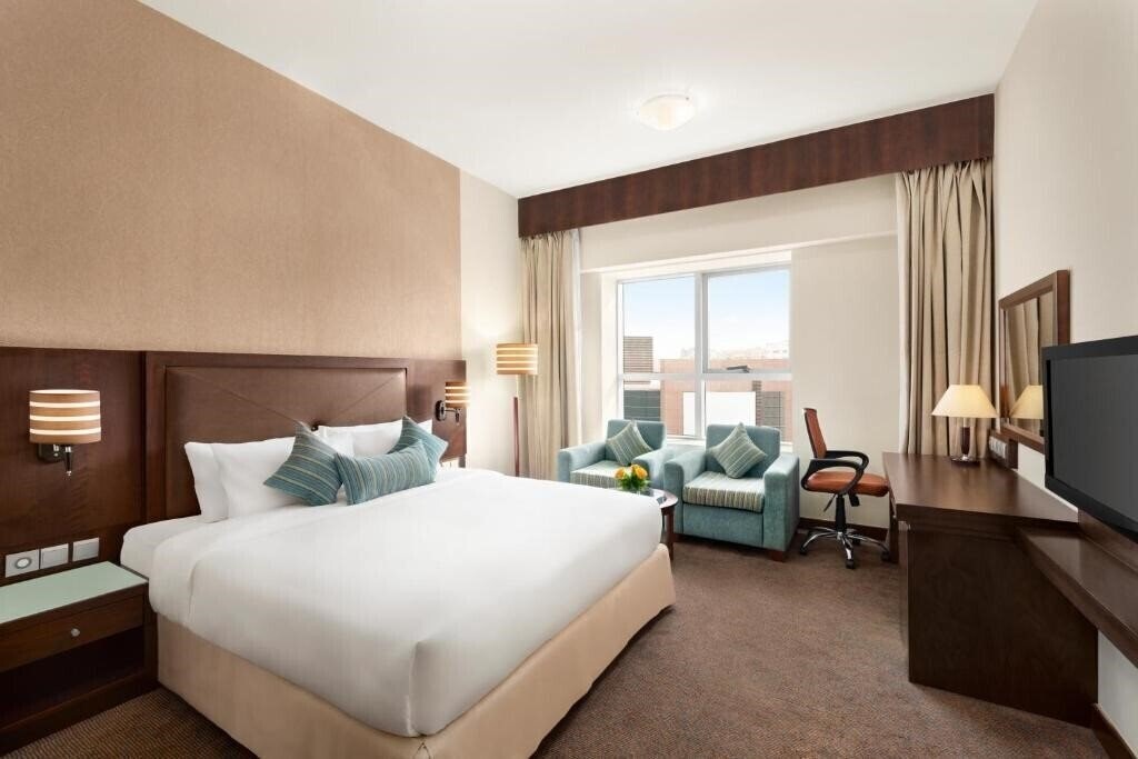 Fotografie Ramada by Wyndham Dubai Deira (ex. Ramada Hotel by Landmark) 4*