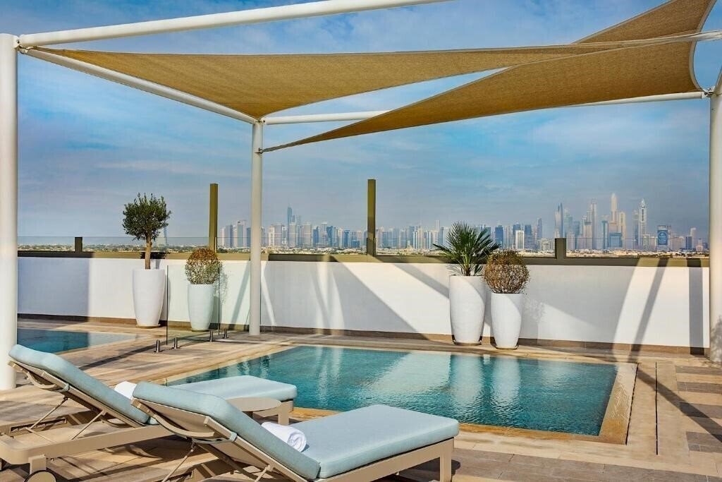 Imaginea Local Dubai Jumeirah Village Triangle 4*
