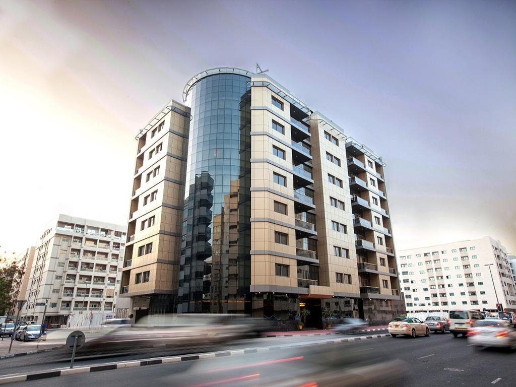 Отель Xclusive Maples Hotel Apartment 4*