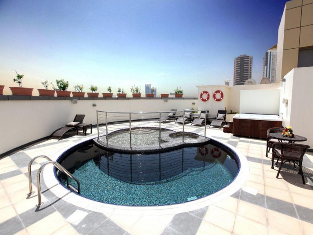 Фото Xclusive Maples Hotel Apartment 4*