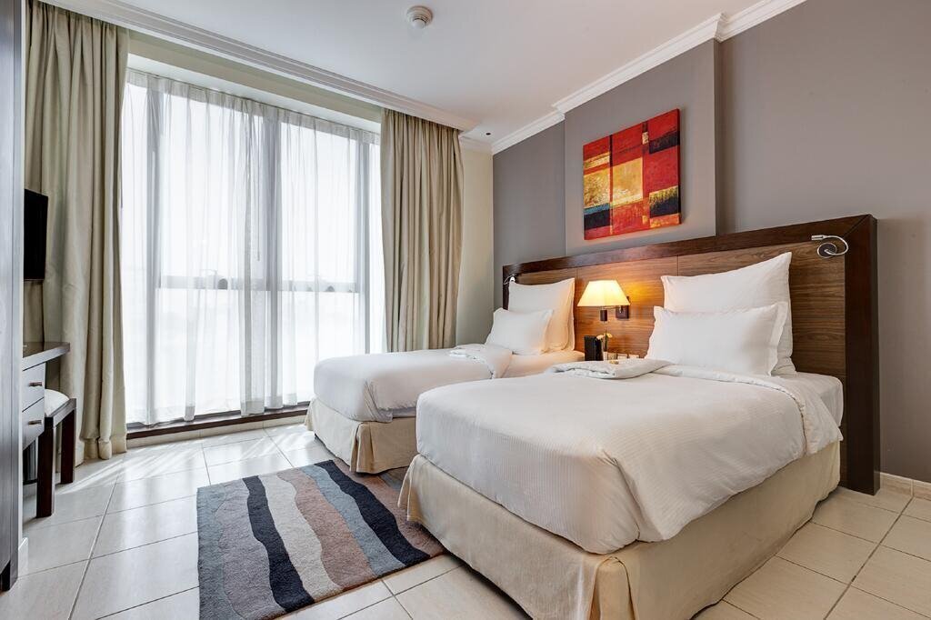 Imaginea Abidos Hotel Apartment Al Barsha апартаменты