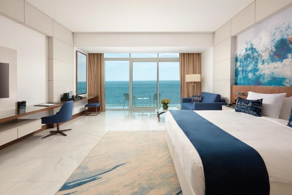 Fotografii Royal M Hotel & Resorts Al Aqah Beach 5*