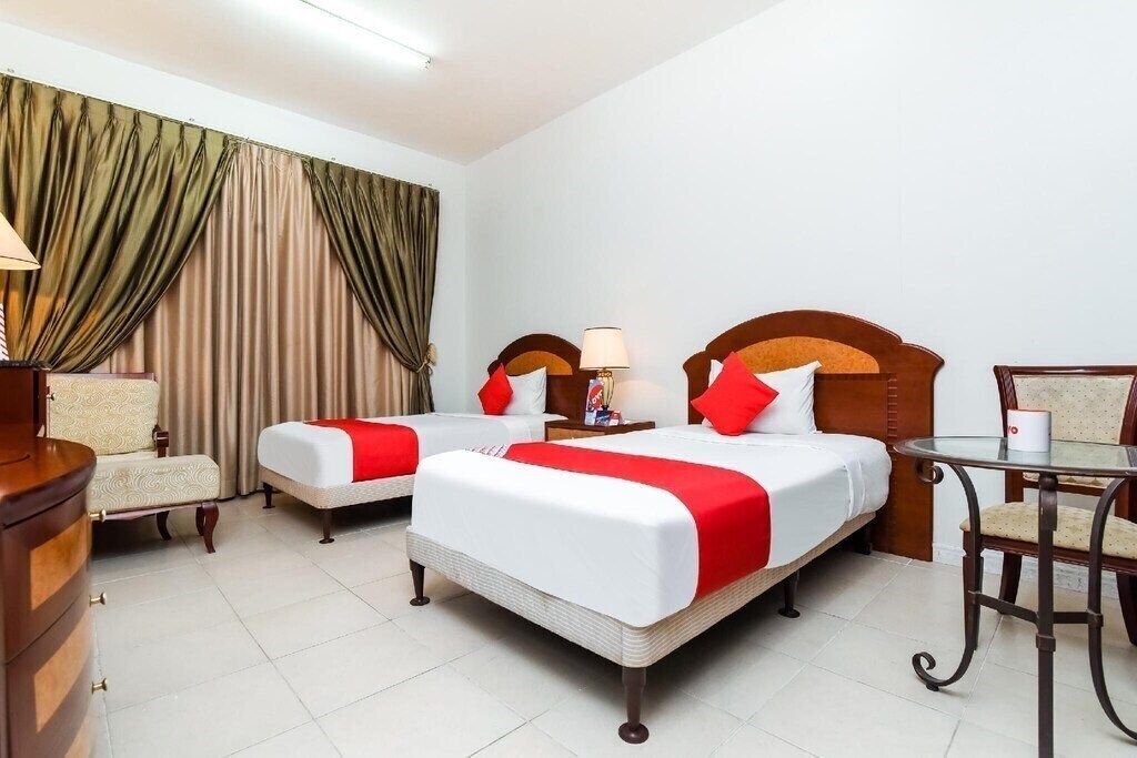 Fotografii OYO 247 Host Palace Hotel Apartment 2*