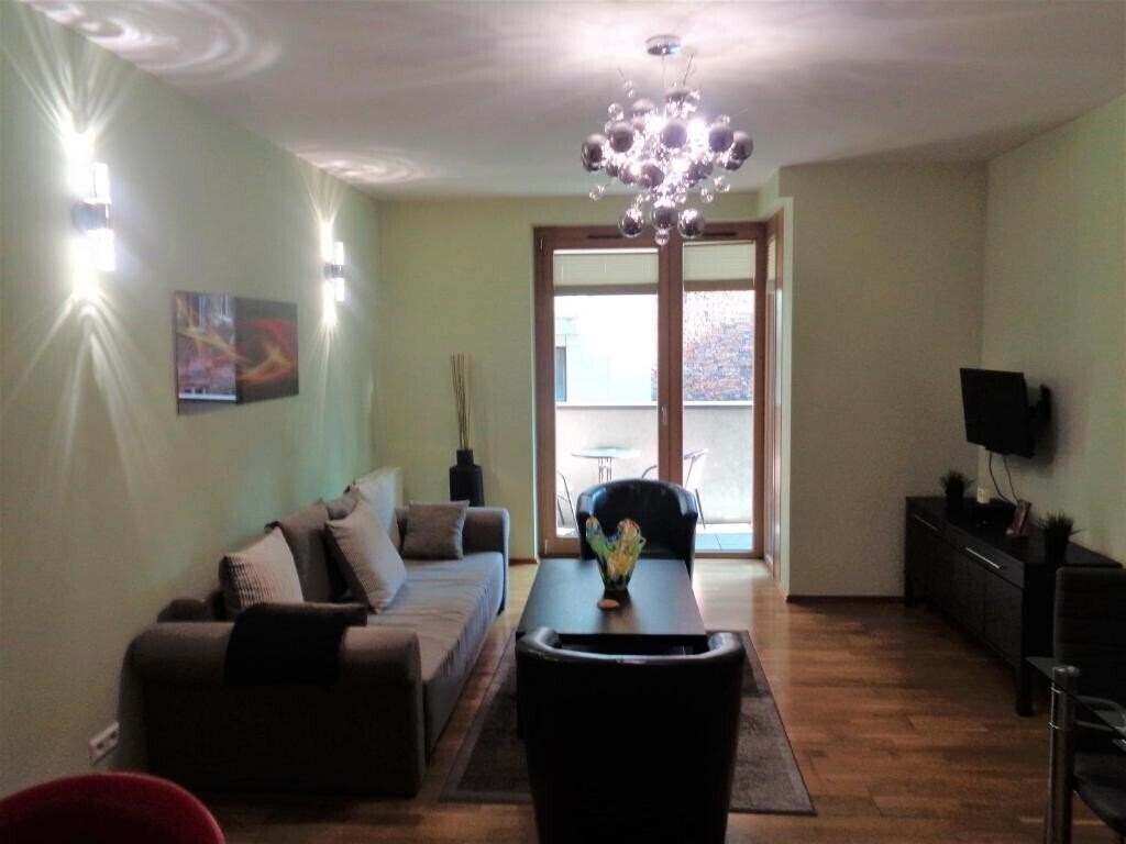 Фото Angel Plaza Apartments 4*