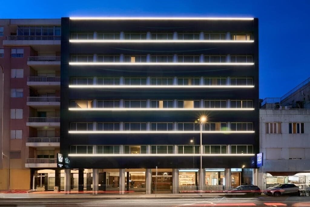 Отель Quality Inn Portus Cale 4*