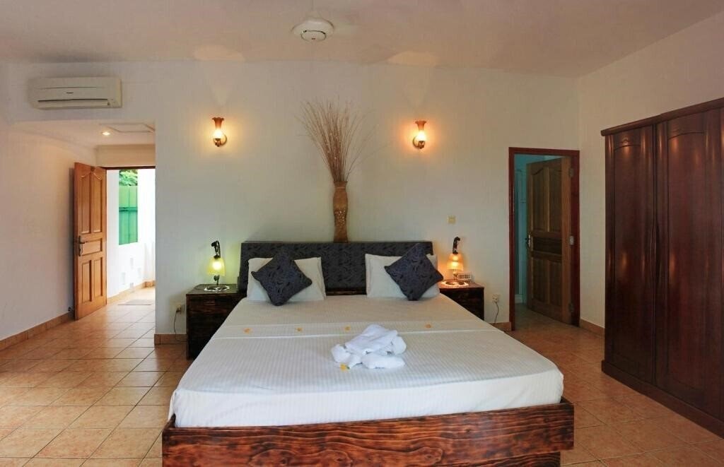 Fotografie Divers Lodge Guest House 3*