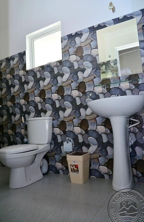 Фото Sea Breeze Guesthouse. 2*