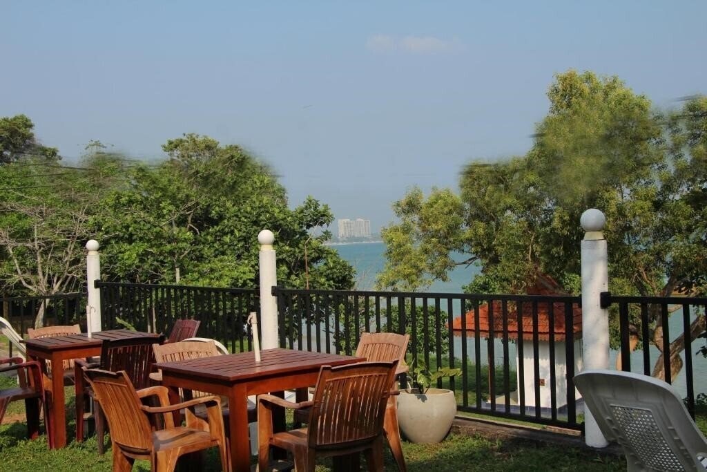 Fotografie Perla Fisherman Bay Guest House гостиный двор
