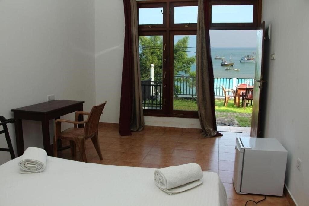 Imaginea Perla Fisherman Bay Guest House гостиный двор