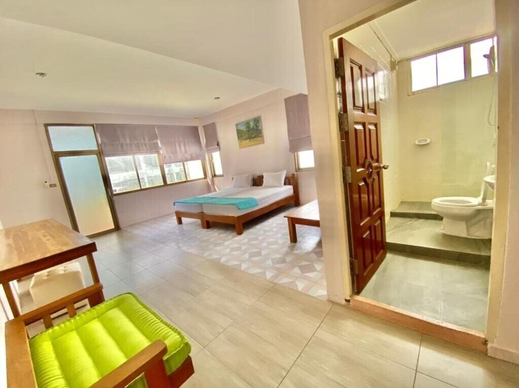 Фотография Oyo 1055 No 7 Guesthouse 2*