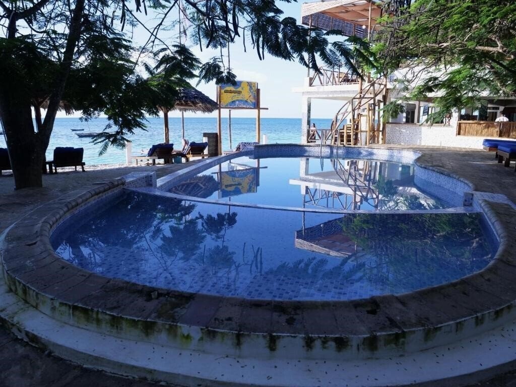 Отель Double A Nungwi Beach Hotel 4*