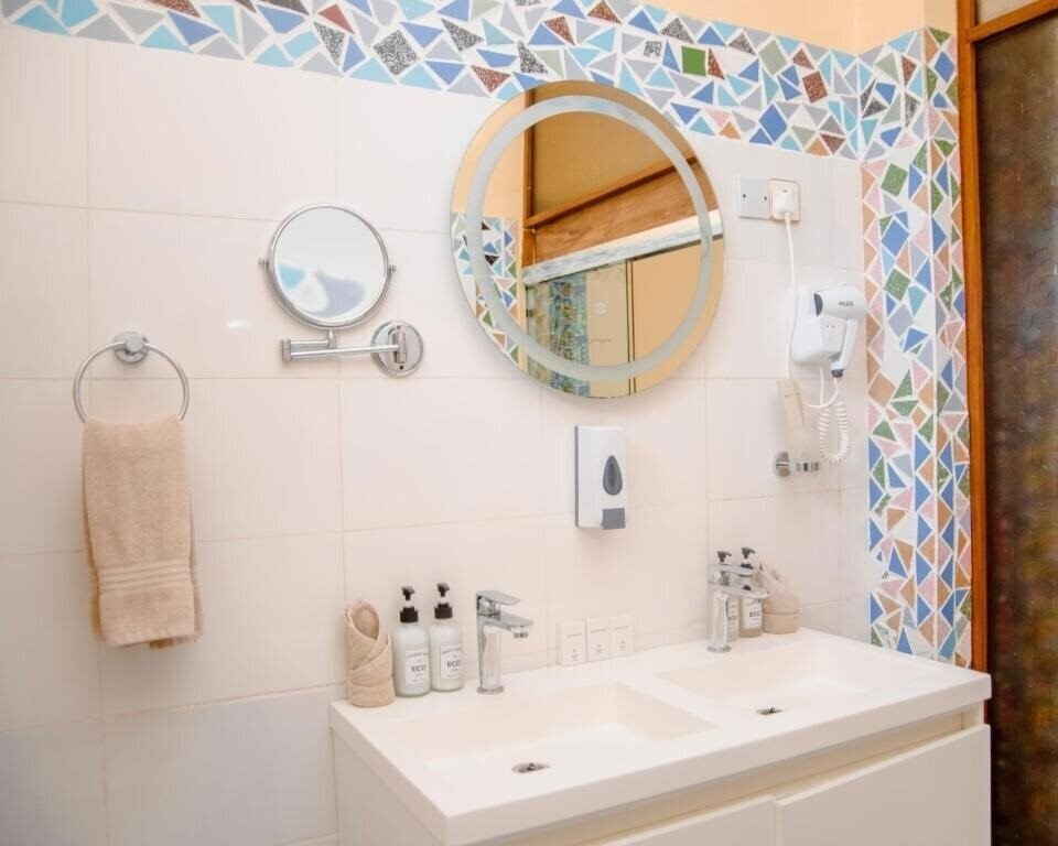 Фотография Double A Nungwi Beach Hotel 4*