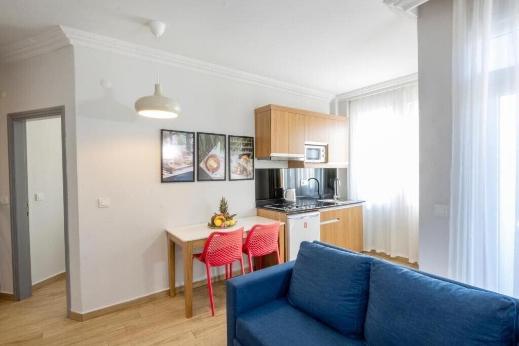 Fotografii Comfort Suites апартаменты