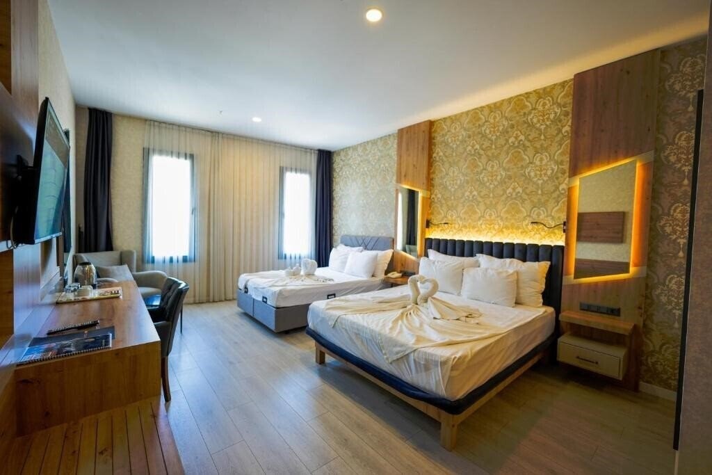 Фото Isnova Hotel 4*