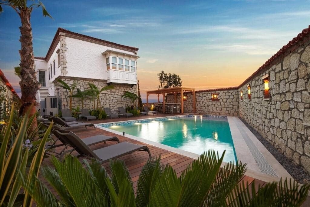 Фото Alacati Eritrina Otel Boutique 3*