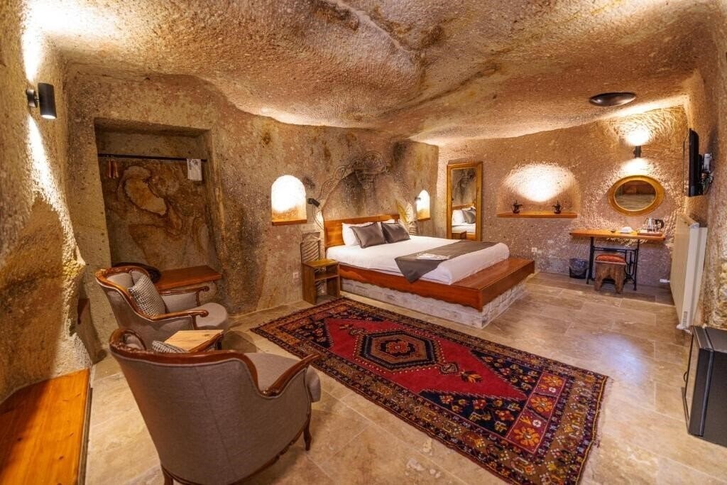 Отель Canyon Cave Hotel (ex. Courtyard Cave Hotel) 3*