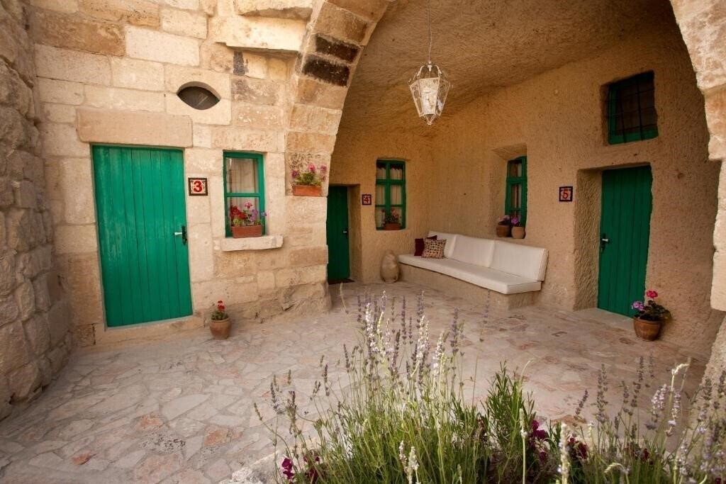 Fotografii Hezen Cave Hotel 4*