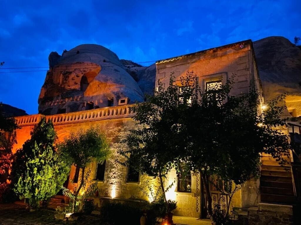 Фото The Village Cave Hotel 4*