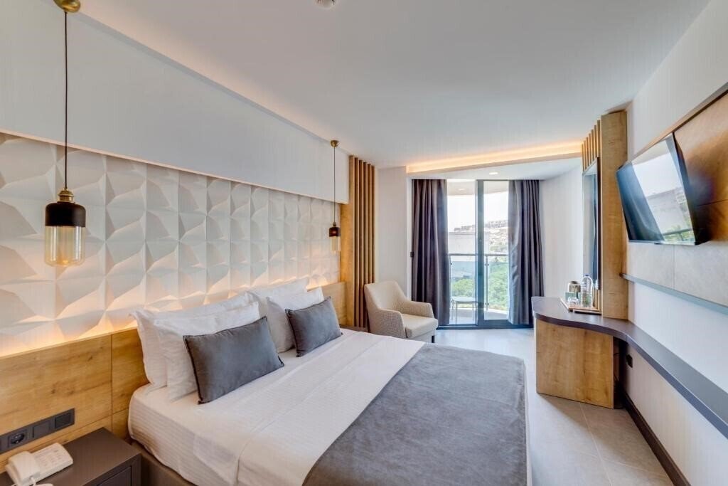 Фото Signature Blue Resort Kusadasi (ex. Grand Ozcelik) 4*