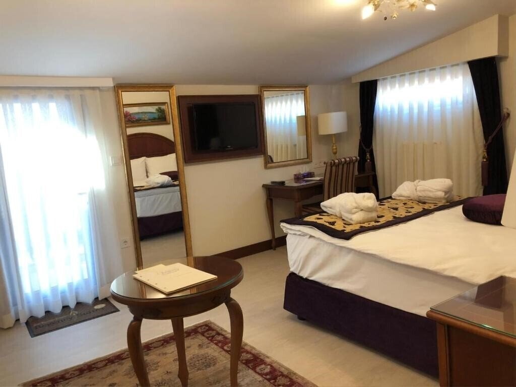 Imaginea GLK Premier Regency Suites & SPA (ex. Best Western Premier Regency Suites & SPA) 4*