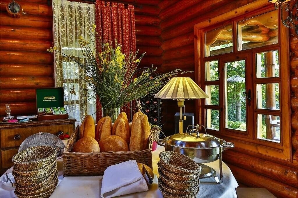 Imaginea Tranquilla River Lodge 3*