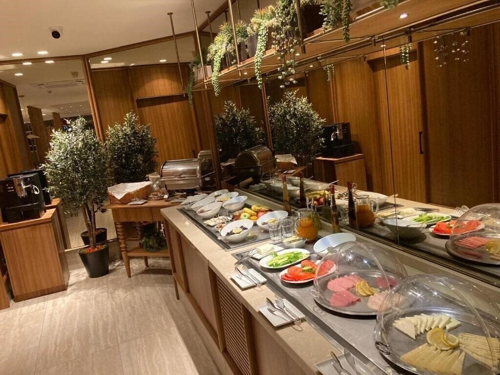 Изображение Housez Suites & Apartments 4*