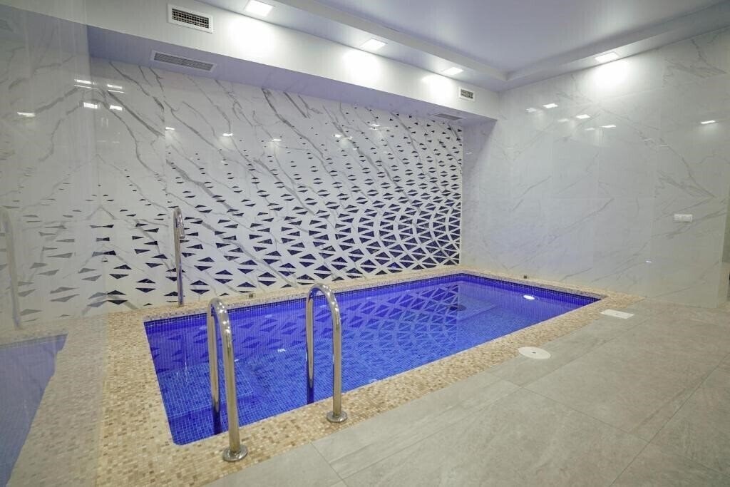 Imaginea Отель Милан 4*