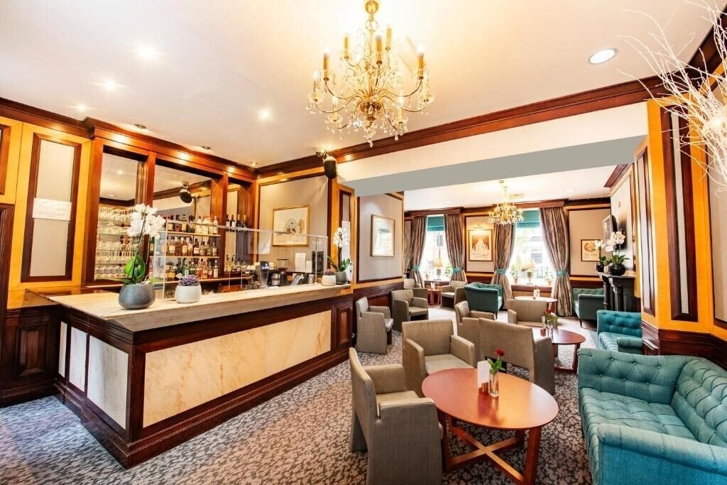 Imaginea Grange Langham Court 4*