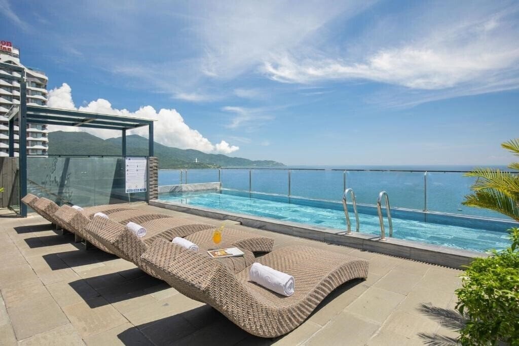 Отель Mangata Beachfront Hotel Danang 4*