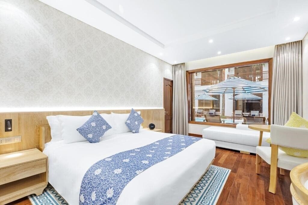 Imaginea Wafaifo Resort Hoi An 5*